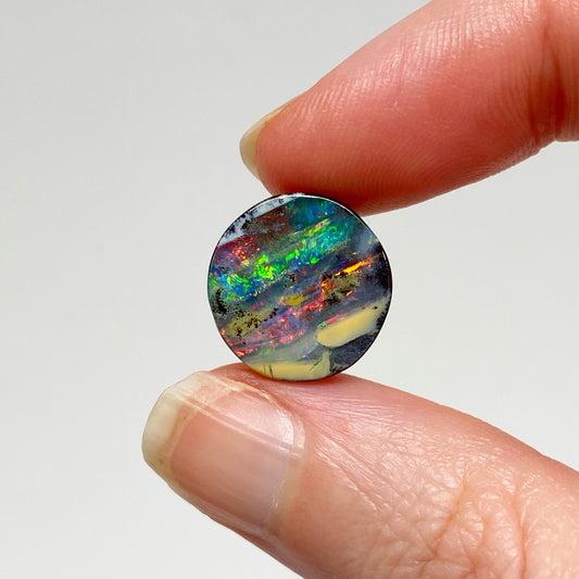 7.05 Ct colorful circle boulder opal