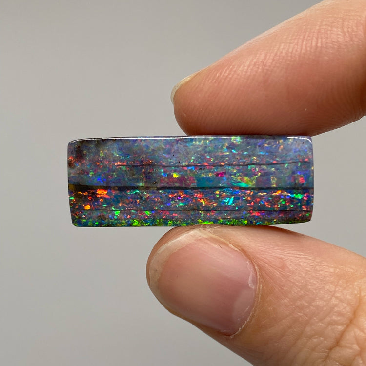 21.35 Ct rainbow stripes boulder opal