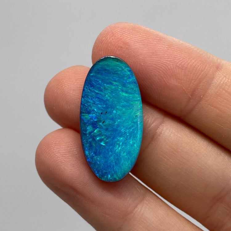 10.08 Ct green-blue oval boulder opal