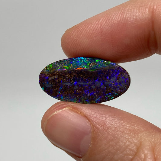 9.54 Ct purple oval boulder opal