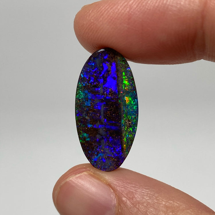 9.54 Ct purple oval boulder opal